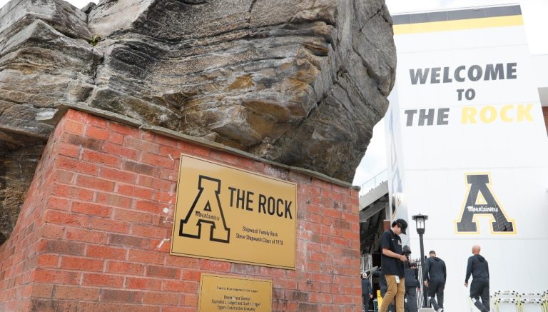 The stadium namesake "The Rock" rests outside of the stadium before a football game between the Appalachian State and North Carolina Tar Heels , Saturday Sept. 3, 2022, in Boone, N.C. (AP Photo/Reinhold Matay)