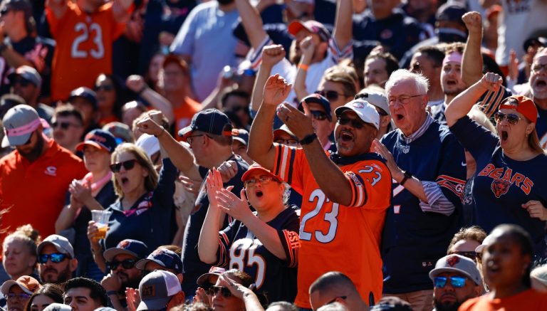Chicago Bears fans cheer during the first half of an NFL football game against the Carolina Panthers, Sunday, Oct. 6, 2024, in Chicago. The Bears defeated the Panthers 36-10. (AP Photo/Kamil Krzaczynski)
