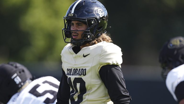 Colorado quarterback Julian Lewis (10) takes part in drills during an NCAA college football practice Thursday, Aug. 14, 2025, in Boulder, Colo.