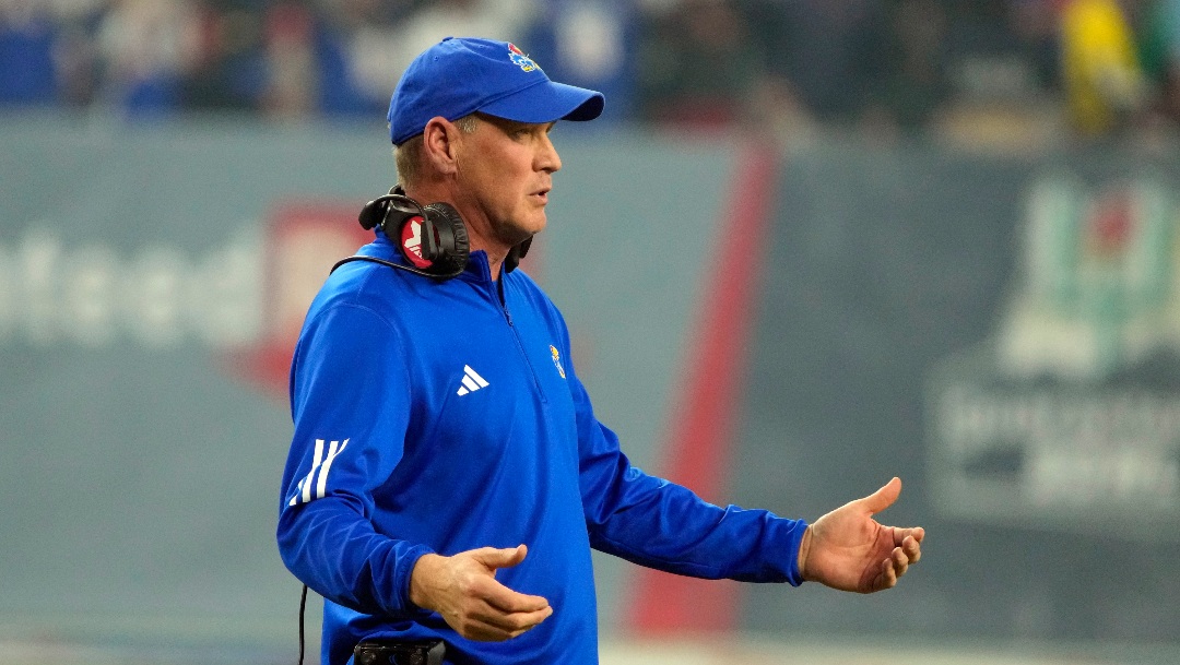 Kansas head coach Lance Leipold during the first half of the Guaranteed Rate Bowl NCAA college football game against UNLV. Tuesday, Dec. 26, 2023, in Phoenix. (AP Photo/Rick Scuteri)