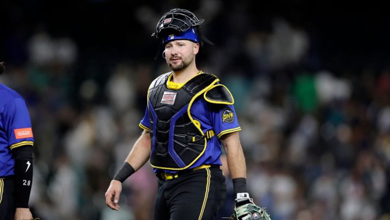 Seattle Mariners catcher Cal Raleigh walks off the field after a baseball game against the Texas Rangers, Thursday, July 31, 2025, in Seattle.