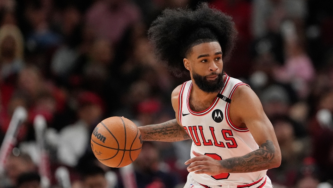 Coby White #0 of the Chicago Bulls dribbles the ball against the Washington Wizards during the third quarter at the United Center on April 11, 2025 in Chicago, Illinois.
