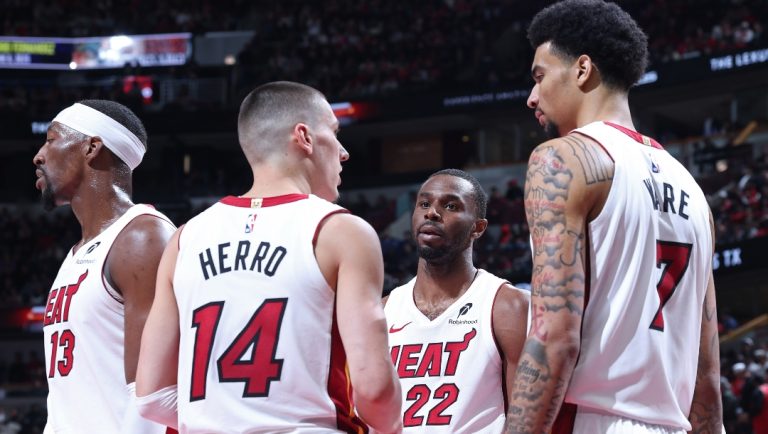 Miami Heat players huddle during the game against the Chicago Bulls during the 2025 SoFi Play-In Tournament on April 16, 2025 at United Center in Chicago, Illinois.
