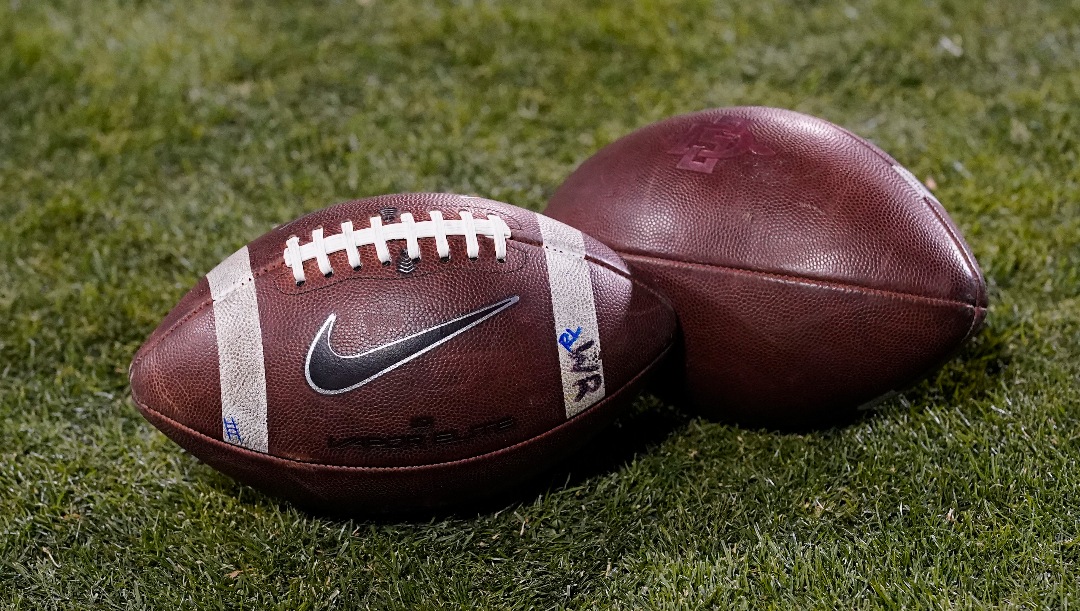 Nike logo dorns a football in the second half of an NCAA college football game Saturday, Nov. 28, 2020, in Boulder, Colo. Colorado won 20-10. (AP Photo/David Zalubowski)