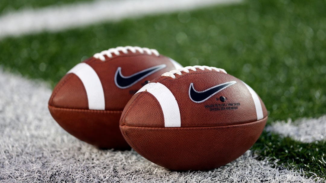 Balls lie on the field before an NCAA college football game between Mississippi and Vanderbilt on Thursday, Aug. 29, 2013, in Nashville, Tenn.