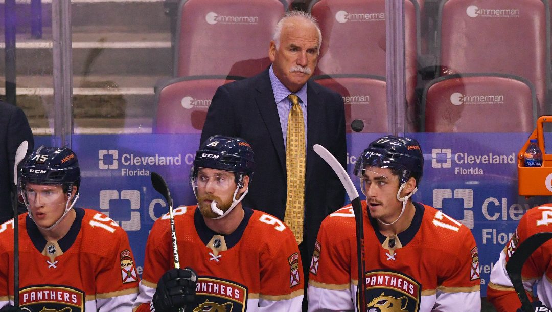 Florida Panthers head coach Joel Quenneville looks on from the bench during the first period of an NHL hockey game against the Colorado Avalanche, Tuesday, Oct. 21, 2021, in Sunrise, Fla.