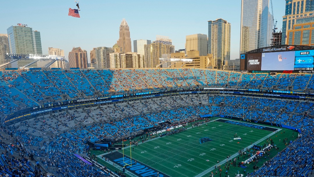 Fans stand for the national anthem before an NFL football game between the Carolina Panthers and the New Orleans Saints Monday, Sept. 18, 2023, in Charlotte, N.C. (AP Photo/Rusty Jones)