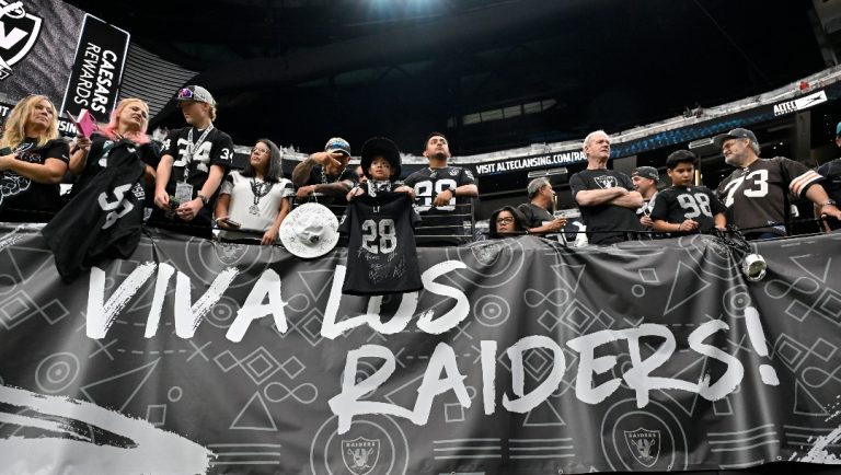 Las Vegas Raiders fans look on before an NFL football game between the Raiders and the Cleveland Browns Sunday, Sept. 29, 2024, in Las Vegas. (AP Photo/David Becker)