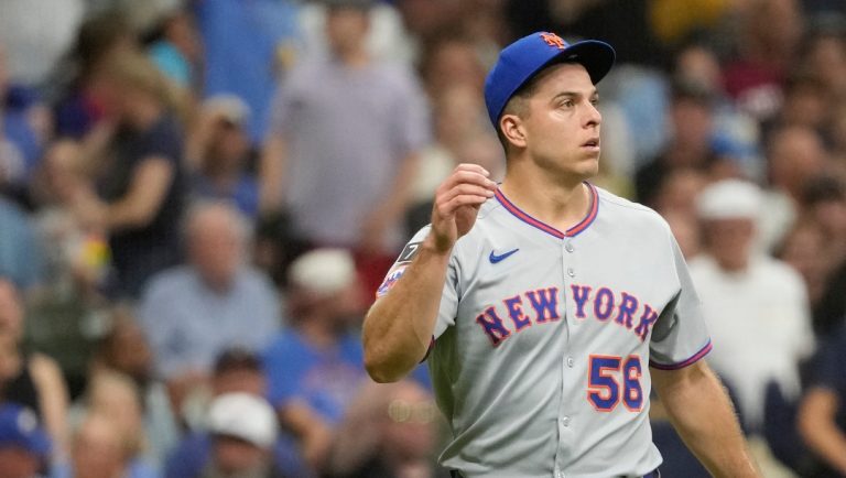 New York Mets' Ryan Helsley looks on during a baseball game against the Milwaukee Brewers, Saturday, Aug. 9, 2025, in Milwaukee. (AP Photo/Aaron Gash)