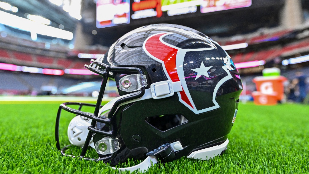 A detail view of a Houston Texans helmet on the sideline prior to an NFL preseason football game against the Carolina Panthers, Saturday, Aug. 16, 2025, in Houston. (AP Photo/Maria Lysaker)