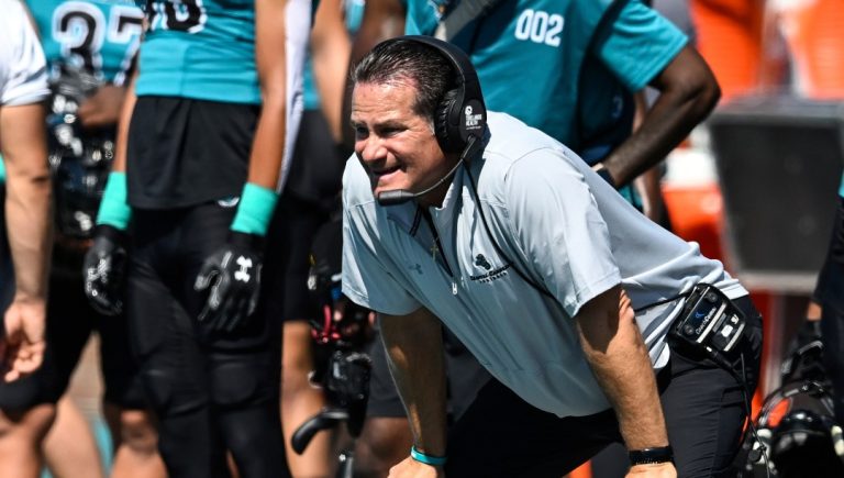 Coastal Carolina head coach Tim Beck looks on during the first half of an NCAA college football game against Virginia on Saturday, Sept. 21, 2024, in Conway, S.C. (AP Photo/Matt Kelley)