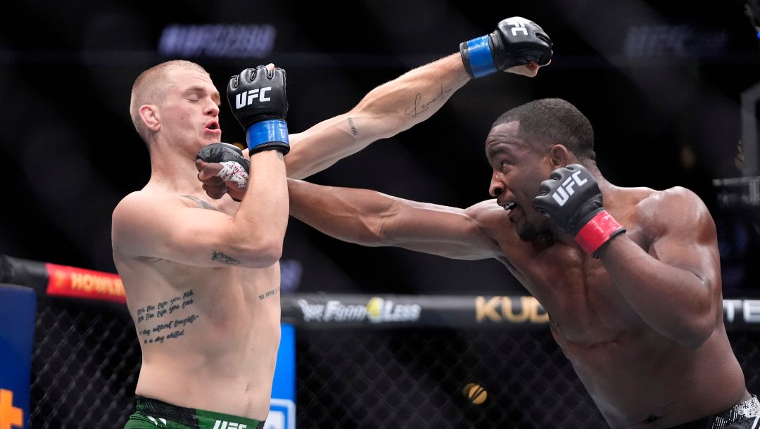 Geoff Neal, right, connects with Ian Machado Garry during their welterweight bout at the UFC 298 mixed martial arts event.