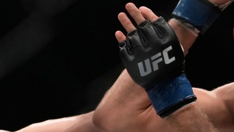 Australia's Robert Whittaker, left, and Reinier de Ridder of the Netherlands fight during a UFC middleweight bout on Sunday.