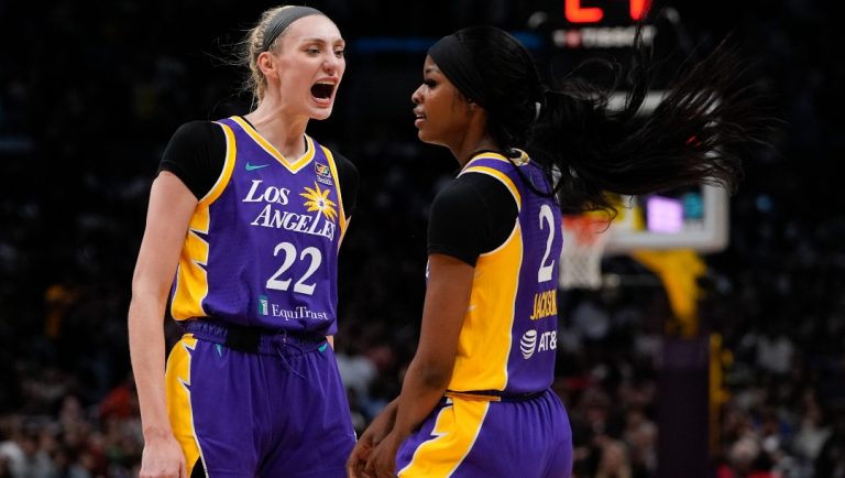 Los Angeles Sparks forward Cameron Brink, left, reacts after forward Rickea Jackson drew a foul during the first half of a WNBA basketball game against the Las Vegas Aces, Sunday, June 9, 2024, in Los Angeles.