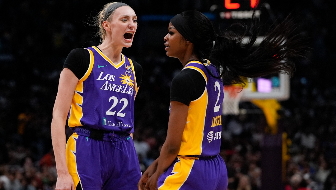Los Angeles Sparks forward Cameron Brink, left, reacts after forward Rickea Jackson drew a foul during the first half of a WNBA basketball game against the Las Vegas Aces, Sunday, June 9, 2024, in Los Angeles.