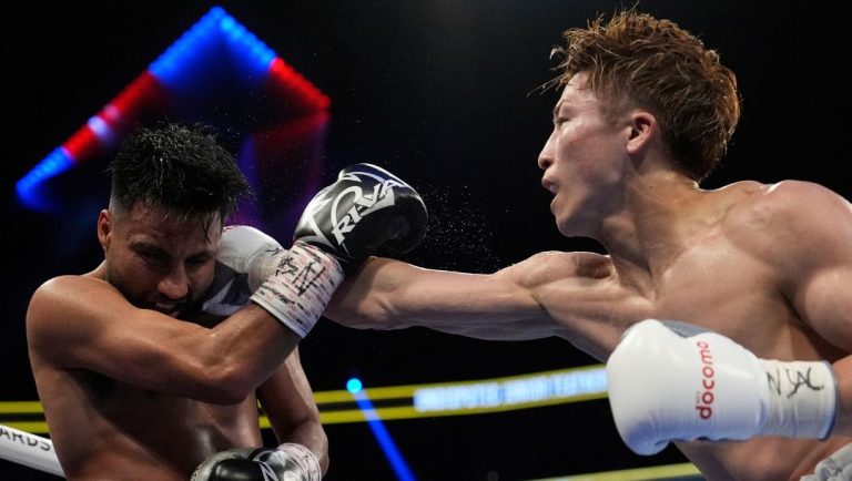 Naoya Inoue hits Ramon Cardenas in a junior featherweight title boxing match Sunday, May 4, 2025, in Las Vegas.