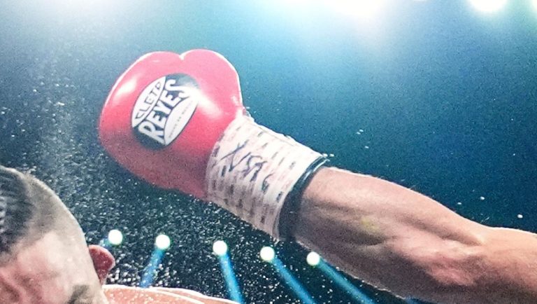 Mario Barrios, left, fights Manny Pacquiao in a welterweight title boxing match Saturday, July 19, 2025, in Las Vegas.