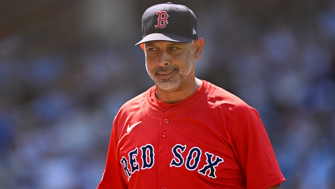 Boston Red Sox manager Alex Cora reacts after a call during the seventh inning of a baseball game against the Chicago Cubs Friday, July 18, 2025, in Chicago.