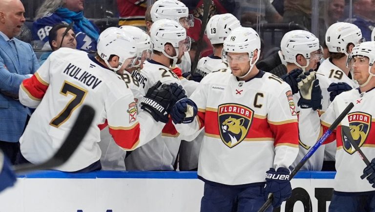 Florida Panthers center Aleksander Barkov (16) celebrates with the bench after scoring against the Tampa Bay Lightning during the second period in Game 5 of an NHL hockey Stanley Cup first-round playoff series, Wednesday, April 30, 2025, in Tampa, Fla.