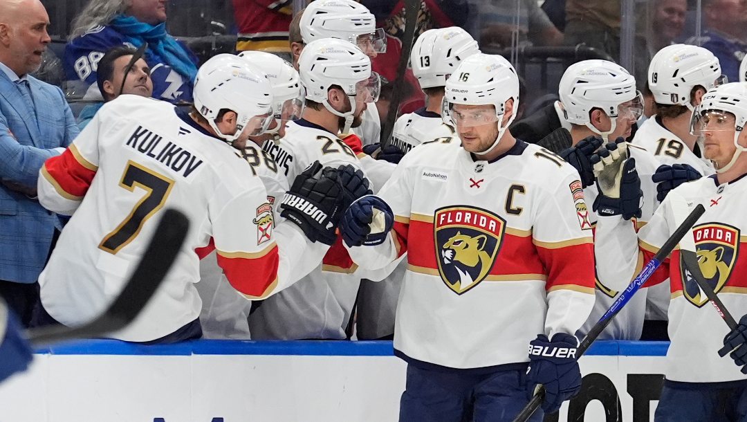 Florida Panthers center Aleksander Barkov (16) celebrates with the bench after scoring against the Tampa Bay Lightning during the second period in Game 5 of an NHL hockey Stanley Cup first-round playoff series, Wednesday, April 30, 2025, in Tampa, Fla.