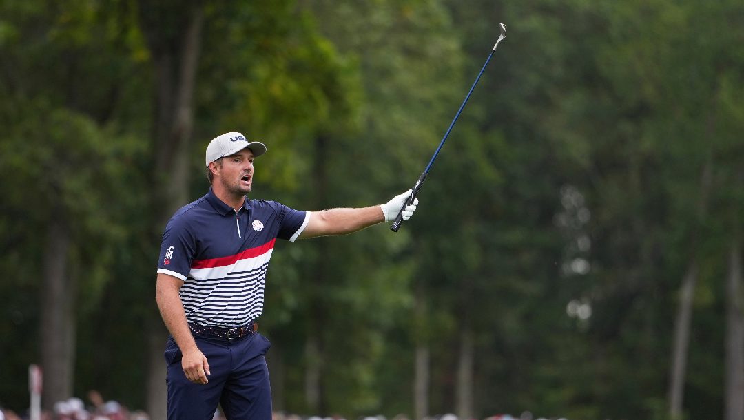 United States' Bryson DeChambeau celebrities on the ninth hole at Bethpage Black golf course during the Ryder Cup golf tournament, Friday, Sept. 26, 2025, in Farmingdale, N.Y.