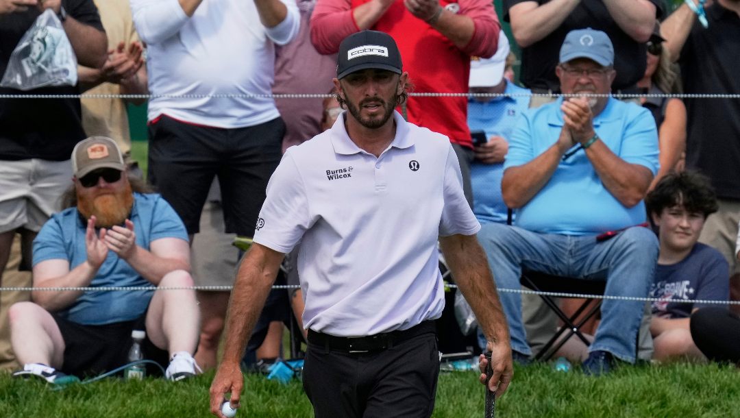 Max Homa gestures after his putt on the 18th green in the first round of the Memorial golf tournament Thursday, May 29, 2025, in Dublin, Ohio.