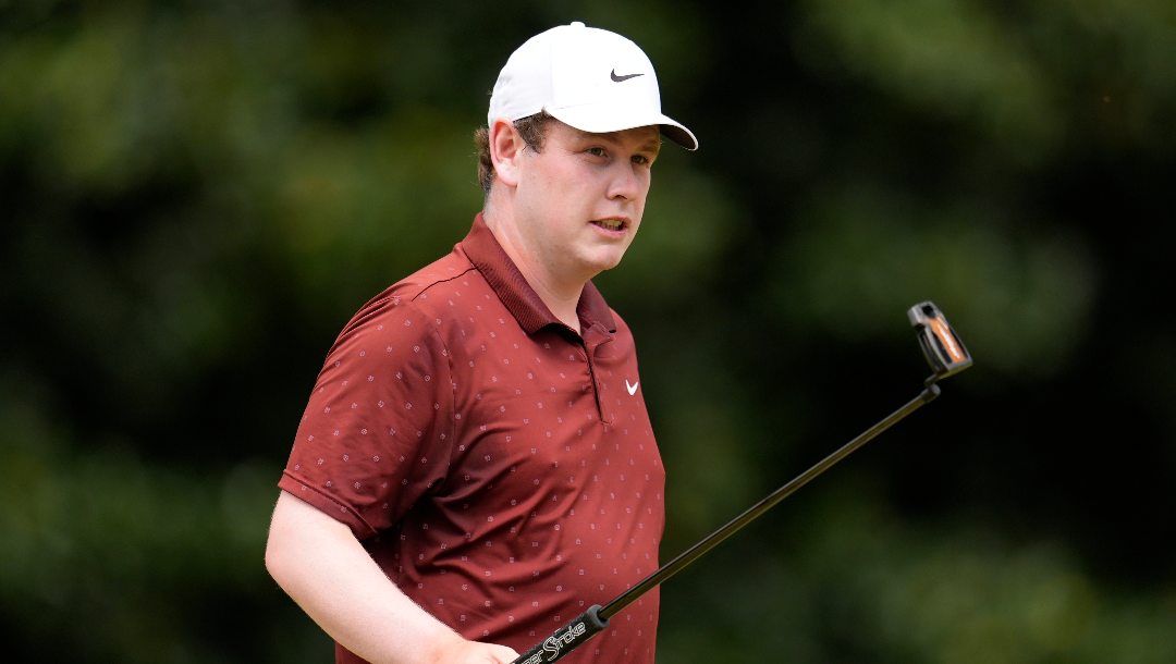 Robert Macintyre, of Scotland, walks off the second green during the third round of the Tour Championship golf tournament, Saturday, Aug. 23, 2025, in Atlanta.