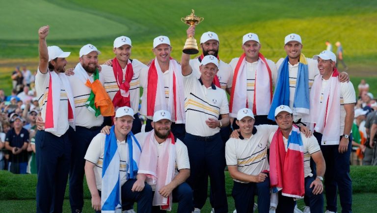 Europe poses with the trophy after winning the Ryder Cup golf tournament against the United States on the Bethpage Black golf course, Sunday, Sept. 28, 2025, in Farmingdale, N.Y.