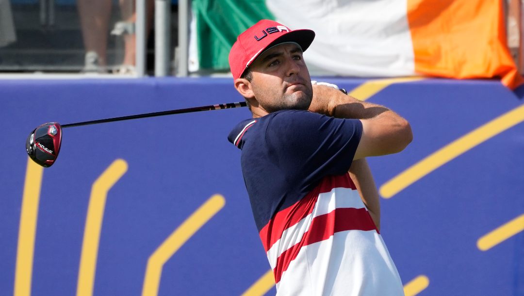 United States' Scottie Scheffler tees off the 1st tee during his singles match at the Ryder Cup golf tournament at the Marco Simone Golf Club in Guidonia Montecelio, Italy, Sunday, Oct. 1, 2023.