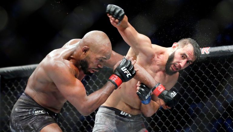 Jon Jones, left, and Dominick Reyes, right, during a light heavyweight mixed martial arts bout at UFC 247 Saturday, Feb. 8, 2020.
