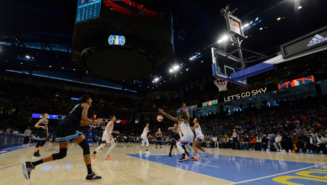 Chicago Sky's Candice Parker (3) passes to teammate Azura Stevens (30) during the final minutes before defeating the Phoenix Mercury 80-74 in Game 4 of the WNBA Finals to become the WNBA Champions Sunday, Oct. 17, 2021, in Chicago.