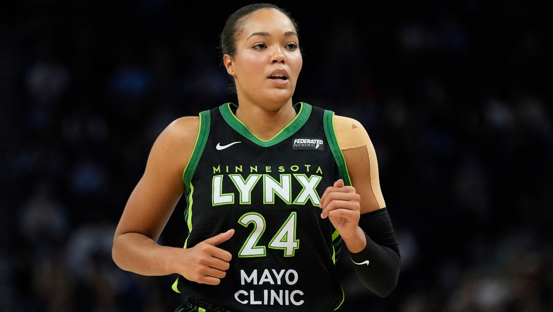 Minnesota Lynx forward Napheesa Collier (24) jogs down the court during the first half of a WNBA basketball game against the Indiana Fever Sunday, Aug. 24, 2025, in Minneapolis.
