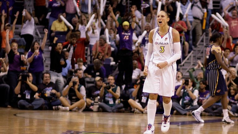 FILE - Phoenix Mercury guard Diana Taurasi (3) celebrates her score against the Indiana Fever as fans cheer in the second quarter of Game 5 of the WNBA basketball finals Friday, Oct. 9, 2009, in Phoenix.