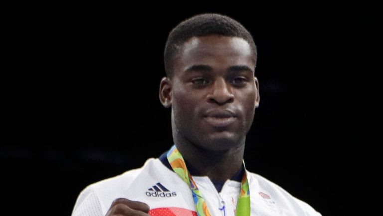 Britain's Joshua Buatsi displays his bronze medal for the men's light heavyweight 81-kg boxing at the 2016 Summer Olympics.