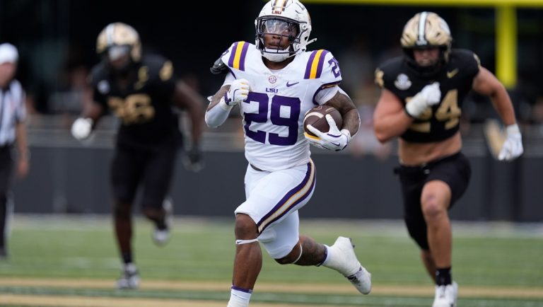 LSU running back Caden Durham (29) runs for a first down during the second half of an NCAA college football game against Vanderbilt, Saturday, Oct. 18, 2025, in Nashville, Tenn.