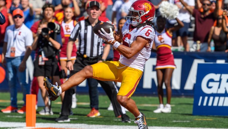 Southern California wide receiver Makai Lemon (6) catches a touchdown pass during the second half of an NCAA college football game against Illinis Saturday, Sept. 27, 2025, in Champaign, Ill.