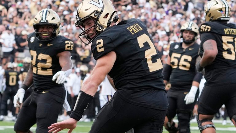 Vanderbilt quarterback Diego Pavia (2) celebrates his touchdown during the second half of an NCAA college football game against LSU, Saturday, Oct. 18, 2025, in Nashville, Tenn.