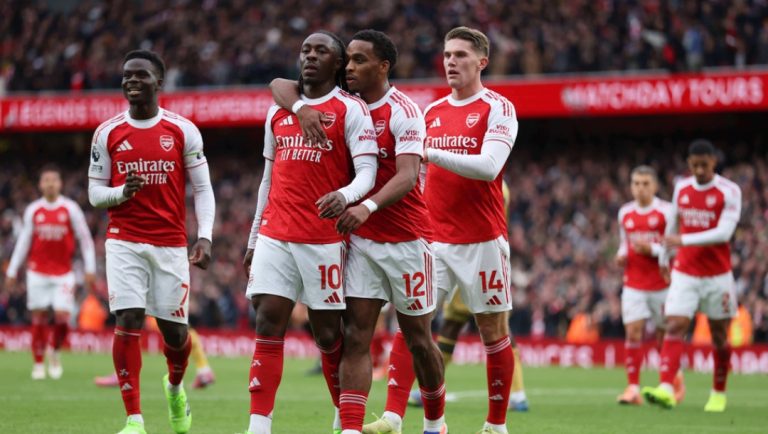 Arsenal's Eberechi Eze, second left, celebrates with his teammates after scoring his side's opening goal during the English Premier League soccer match between Arsenal and Crystal Palace in London, Sunday, Oct. 26, 2025.
