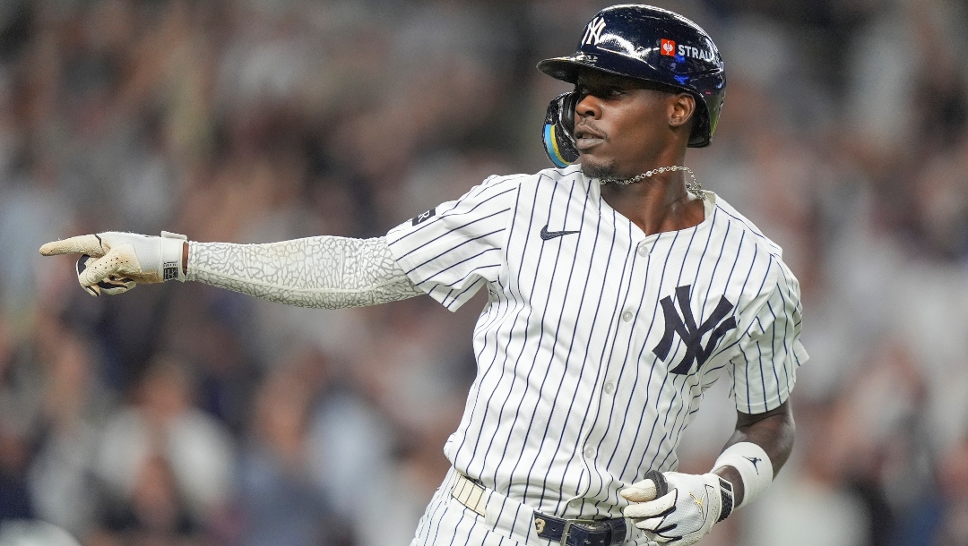 New York Yankees' Jazz Chisholm Jr. reacts after connecting for a solo home run against the Toronto Blue Jays during the fifth inning of Game 3 of baseball's American League Division Series, Tuesday, Oct. 7, 2025, in New York.