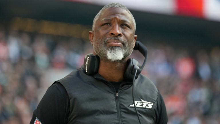 New York Jets head coach Aaron Glenn stands on the touchline just before the start of an NFL football game between the Denver Broncos and the New York Jets, Sunday, Oct. 12, 2025, in London.