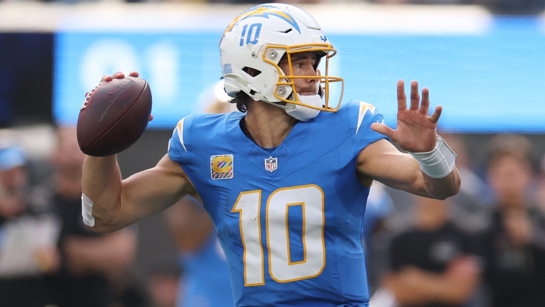 Los Angeles Chargers quarterback Justin Herbert (10) throws a pass during the first half of an NFL football game against the Washington Commanders, Sunday, Oct. 5, 2025, in Inglewood, Calif.