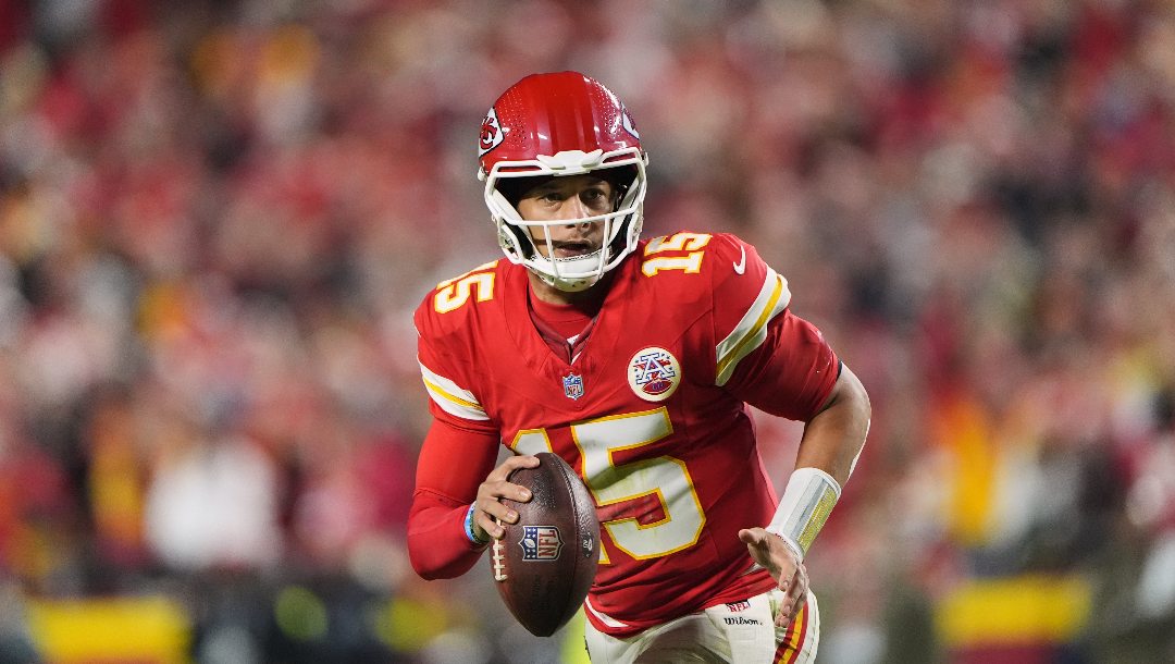 Kansas City Chiefs quarterback Patrick Mahomes looks to pass during the second half of an NFL football game against the Washington Commanders, Monday, Oct. 27, 2025, in Kansas City, Mo.