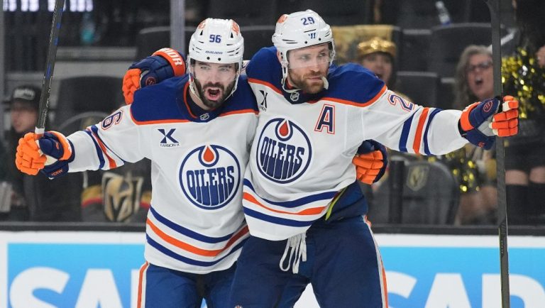 Edmonton Oilers center Leon Draisaitl (29) celebrates with teammates after scoring against the Vegas Golden Knights during the third period of Game 1 of a second-round NHL hockey playoff series Tuesday, May 6, 2025, in Las Vegas.