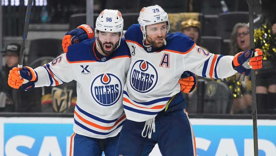 Edmonton Oilers center Leon Draisaitl (29) celebrates with teammates after scoring against the Vegas Golden Knights during the third period of Game 1 of a second-round NHL hockey playoff series Tuesday, May 6, 2025, in Las Vegas.