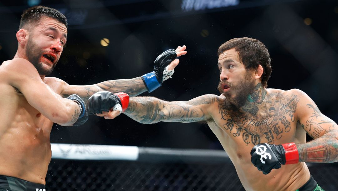 Marlon Vera lands a right against Pedro Munhoz during a UFC 292 mixed martial arts fight, Saturday, August 19, 2023.