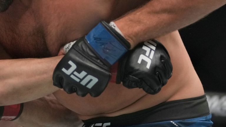 Australia's Robert Whittaker, left, and Reinier de Ridder of the Netherlands fight during a UFC middleweight bout on Sunday.