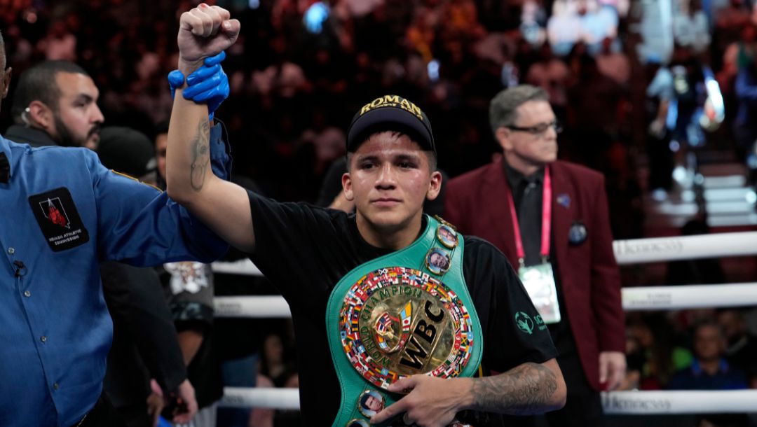 Jesse Rodriguez celebrates his win over Israel Gonzalez by unanimous decision after their super flyweight title boxing match.