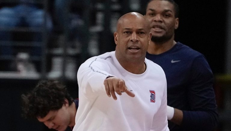 Detroit Mercy head coach Mark Montgomery reacts during the first half of an NCAA college basketball game Sunday, Dec. 22, 2024, in Madison, Wis. (AP Photo/Morry Gash)