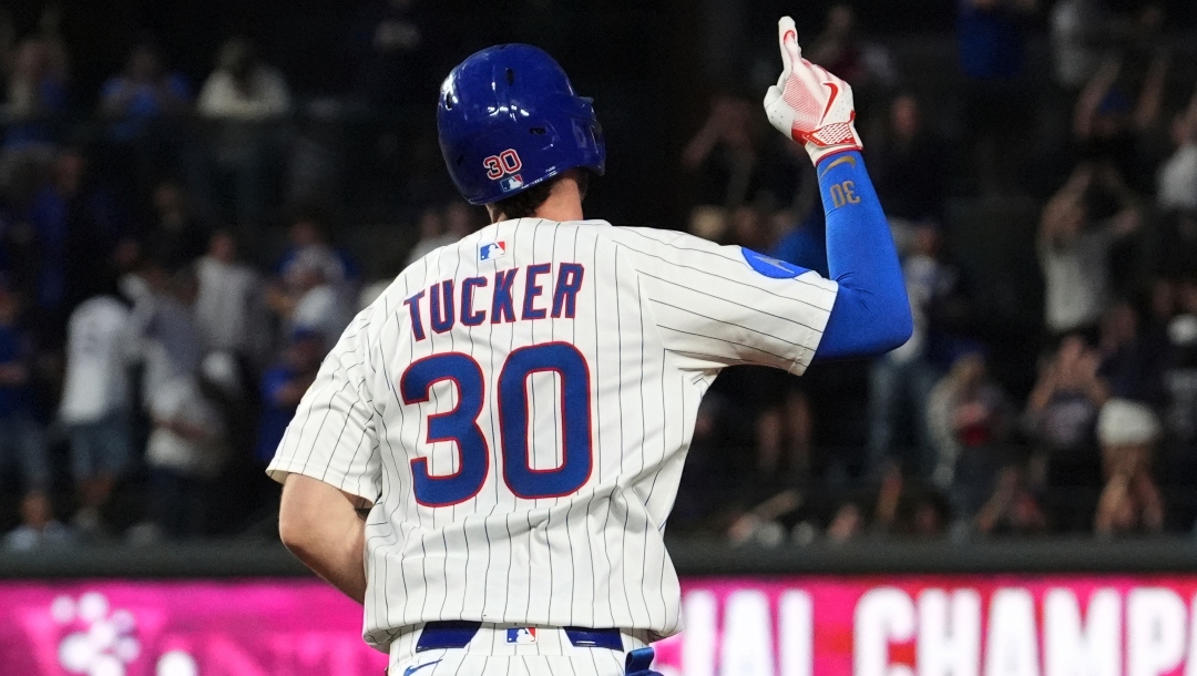 Chicago Cubs' Kyle Tucker celebrates as he rounds the bases after hitting a three-run home run during the third inning of a baseball game against the Atlanta Braves in Chicago, Tuesday, Sept. 2, 2025.