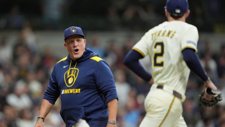Milwaukee Brewers manager Pat Murphy talks to Brice Turang (2) during a baseball game against the Arizona Diamondbacks, Wednesday, Aug. 27, 2025, in Milwaukee.